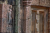 Banteay Srei temple - sculpted devata figure in niches